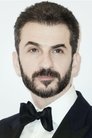 Michael Aronov isDr. Nima Rousseau