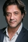 Enrique Arce isBruce Russell