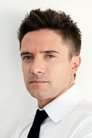 Topher Grace isVenom / Eddie Brock